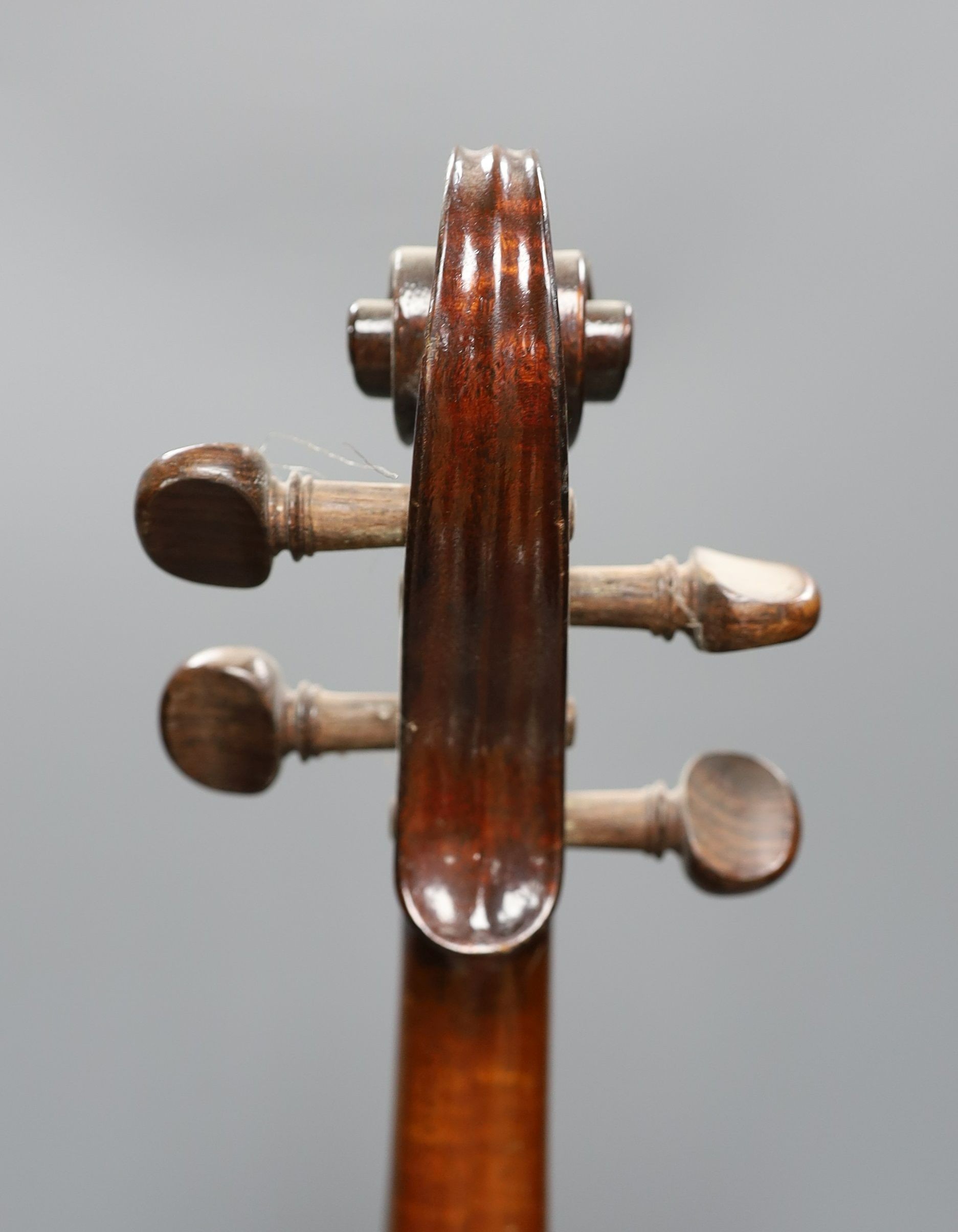 A cased 19th century violin